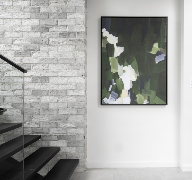 Modern abstract painting in minimalist home interior.